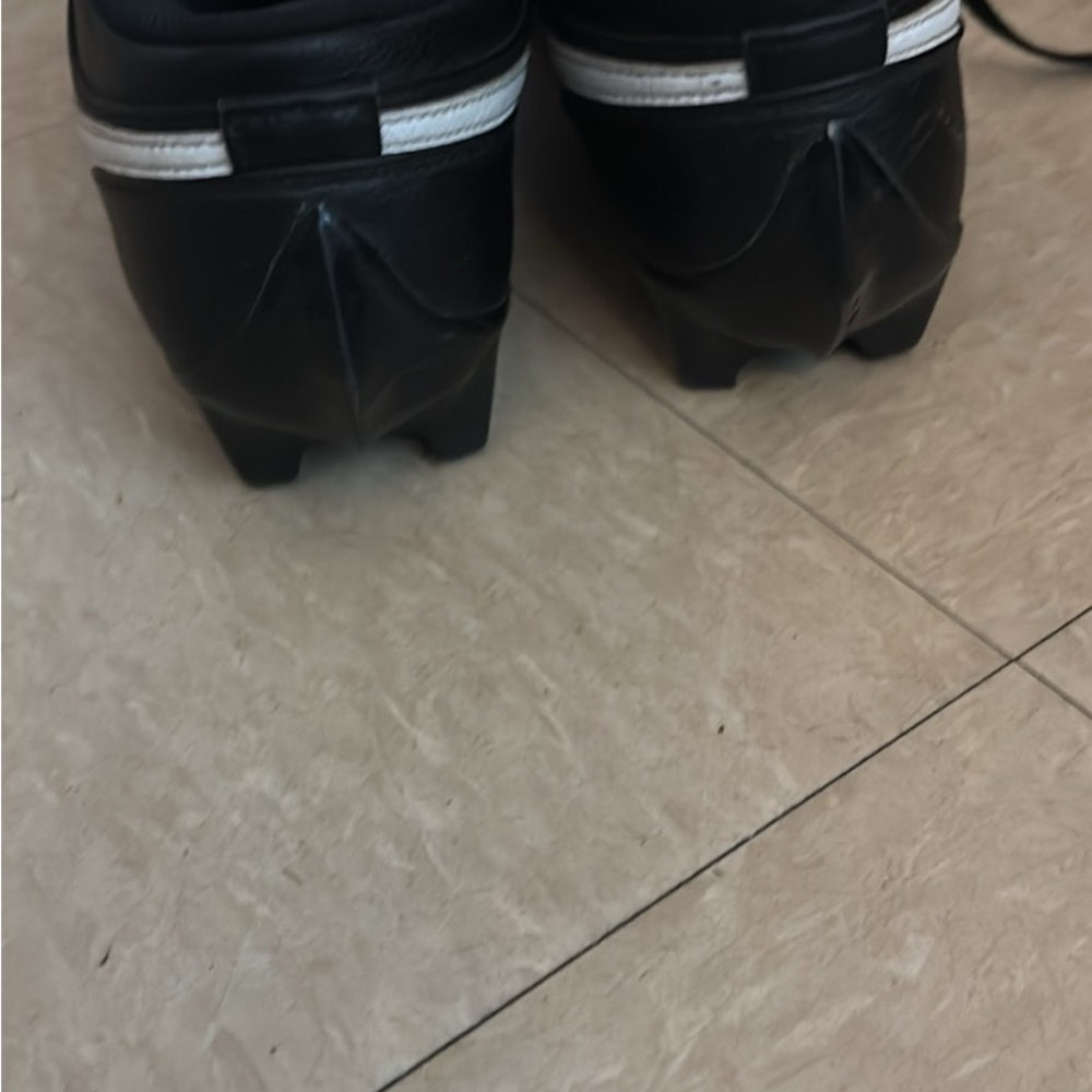 Nike Black and White Athletic Shoes (football cleats)